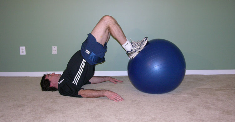 leg curl with exercise ball