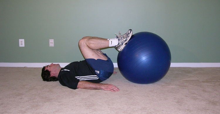 leg curl with exercise ball